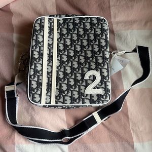 The Christian Dior Oblique Trotter Corssbody Bag